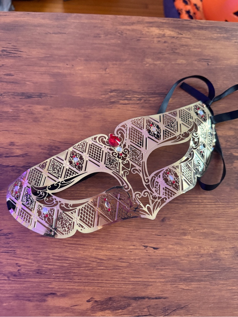 Elegant Gold Venetian Eye Mask with Red Gem Accents